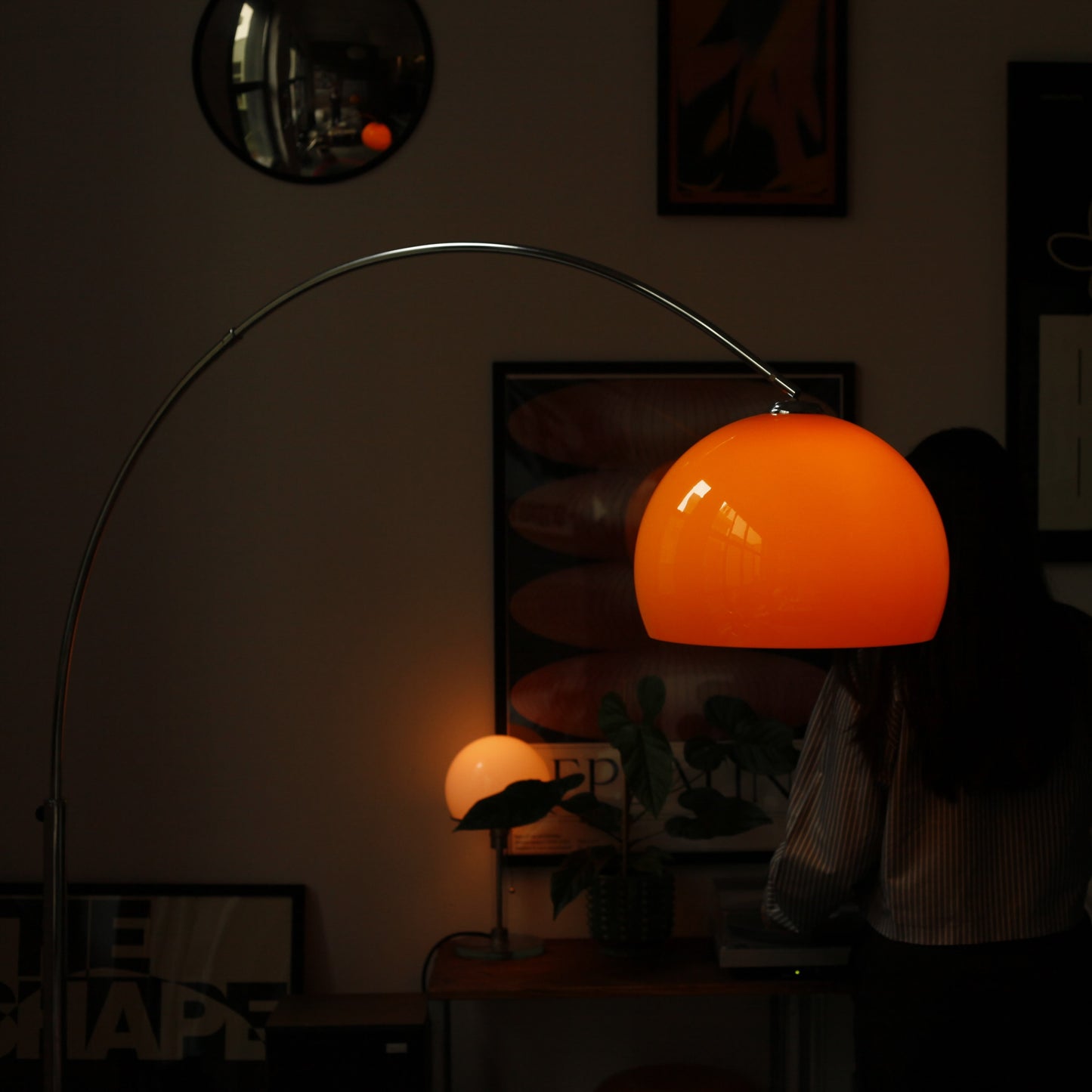 Cosy Warm Orange Arch Lamp in mid-century modern living room with marble base