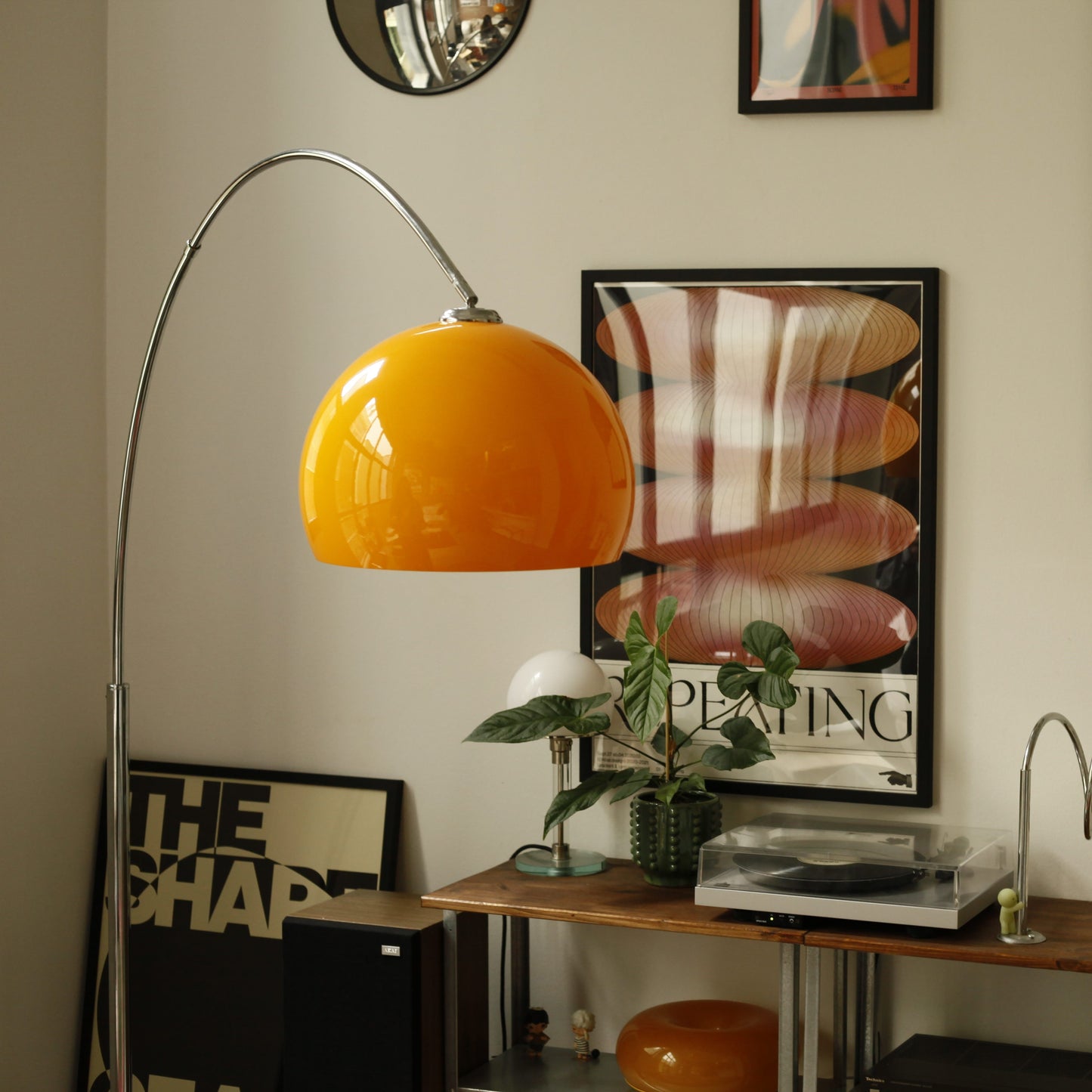 Standalone product shot of Orange Arch Lamp against neutral backdrop