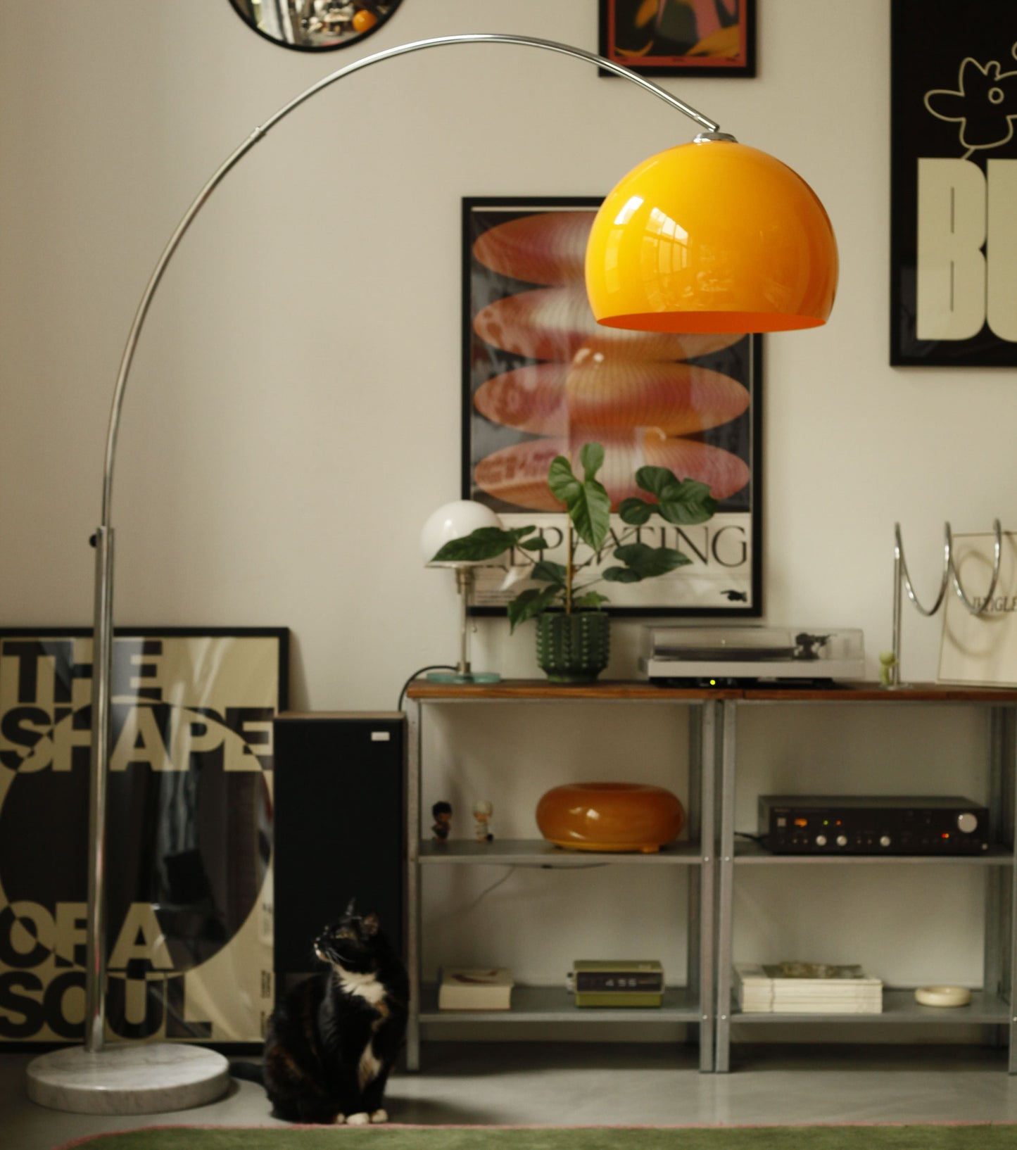 Orange Arch Lamp in mid-century modern living room with marble base